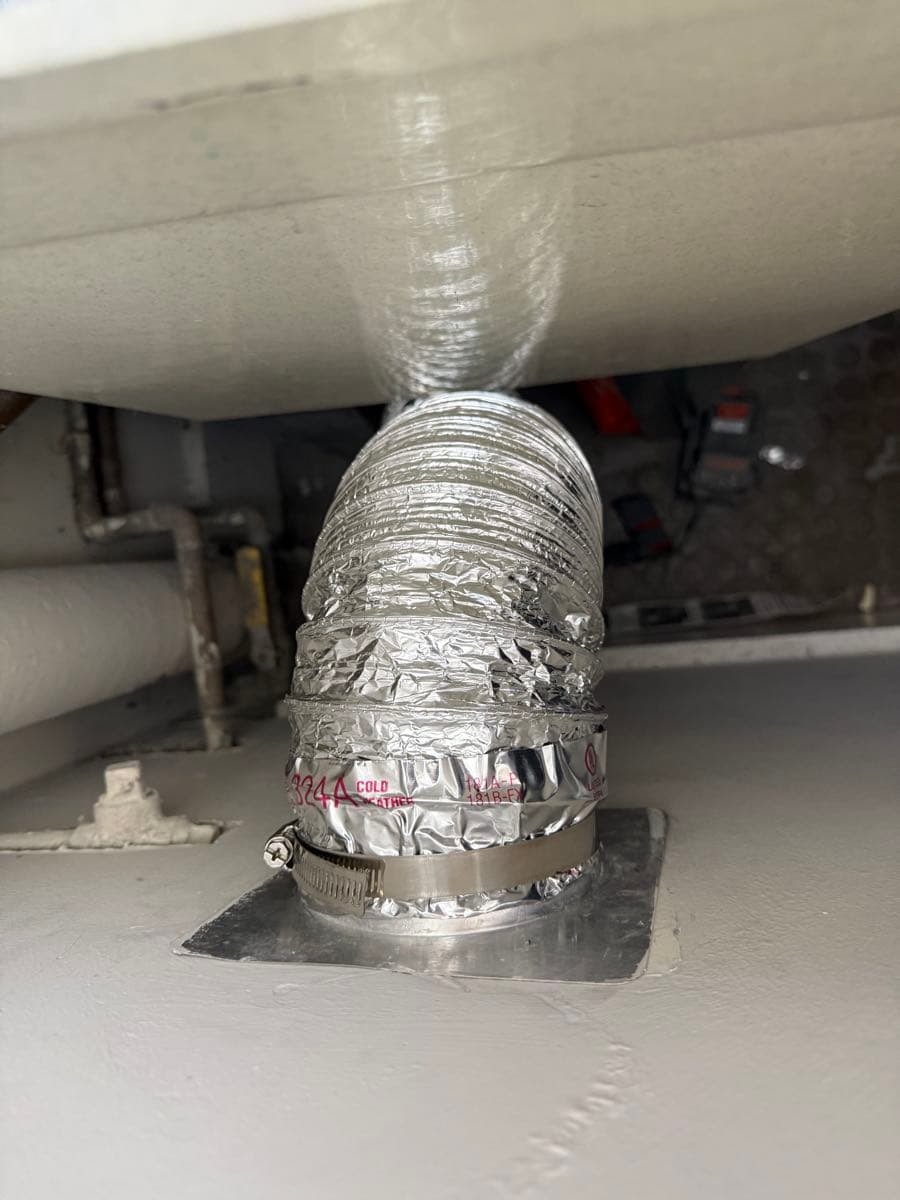 Dryer vent system upgrade showing proper metal duct installation techniques