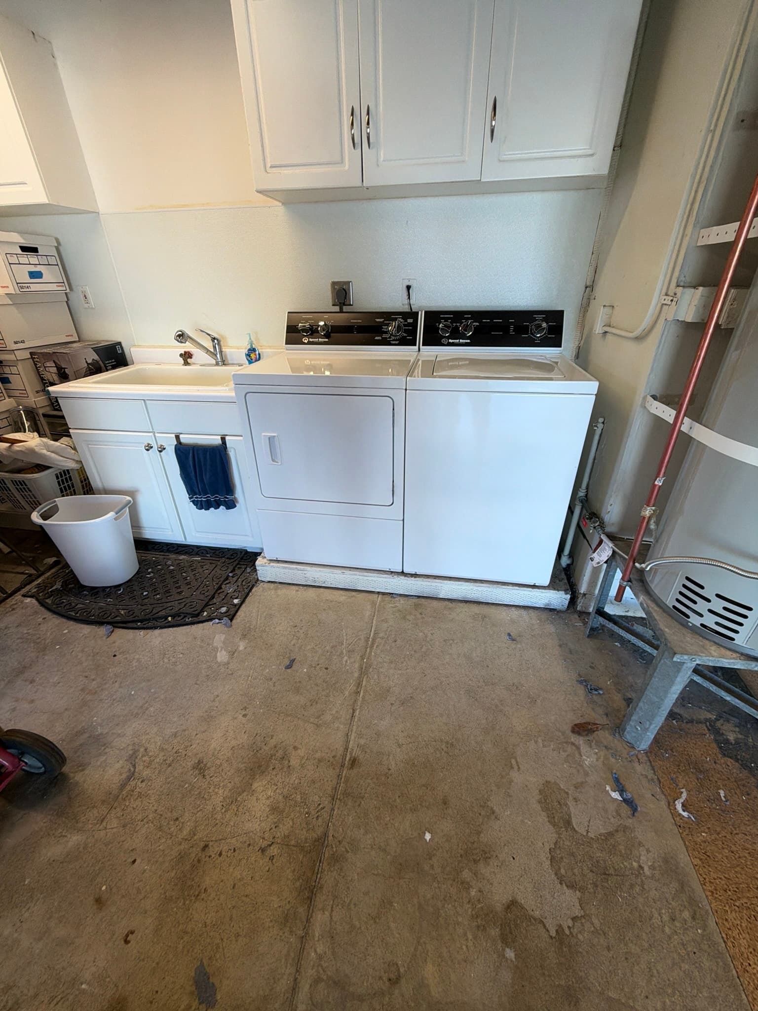 View of the exterior dryer vent cap and termination point on the home's exterior wall