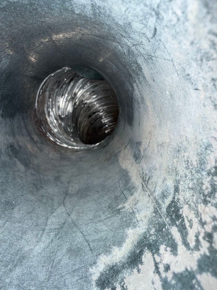Dryer vent cleaning process showing lint removal and duct restoration