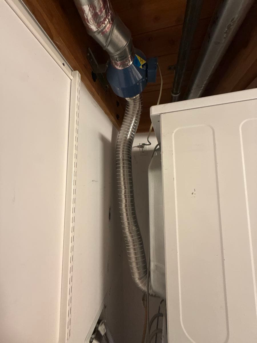 Before cleaning: dryer vent interior showing lint accumulation