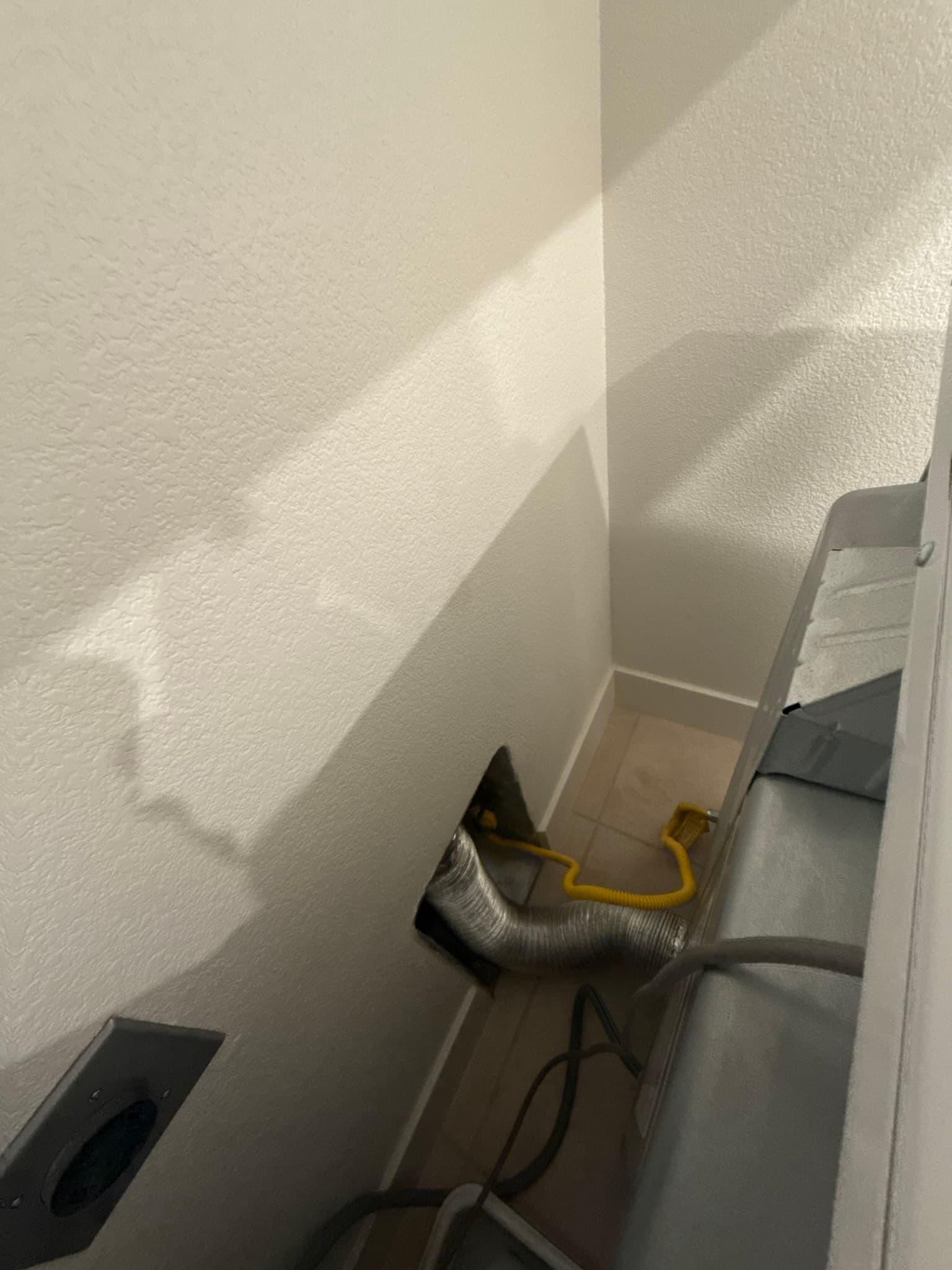 Dryer exhaust duct section after cleaning and repair work completed at a Pacifica residence