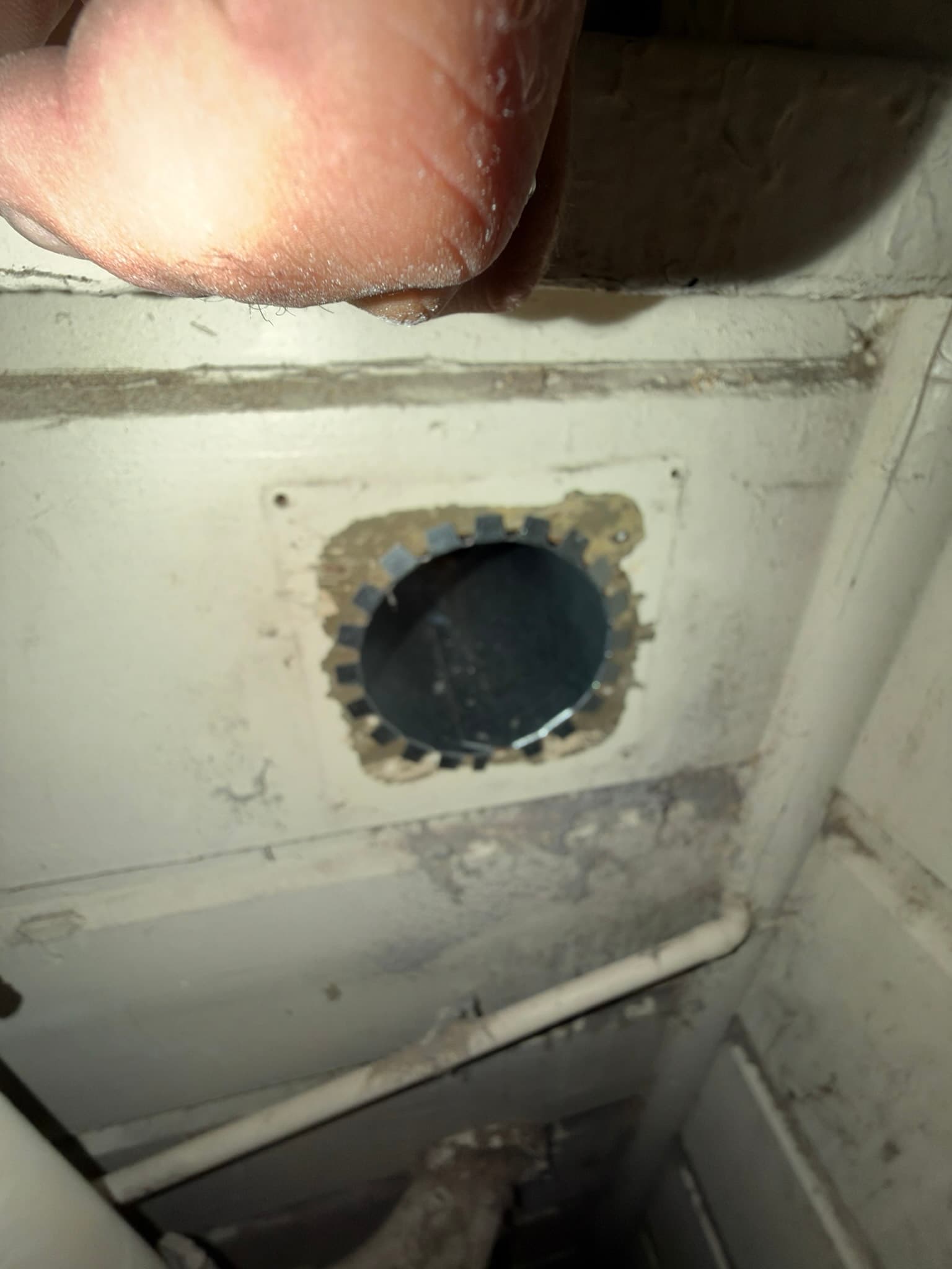 Interior view of the transition duct connection secured with a stainless steel worm-gear clamp
