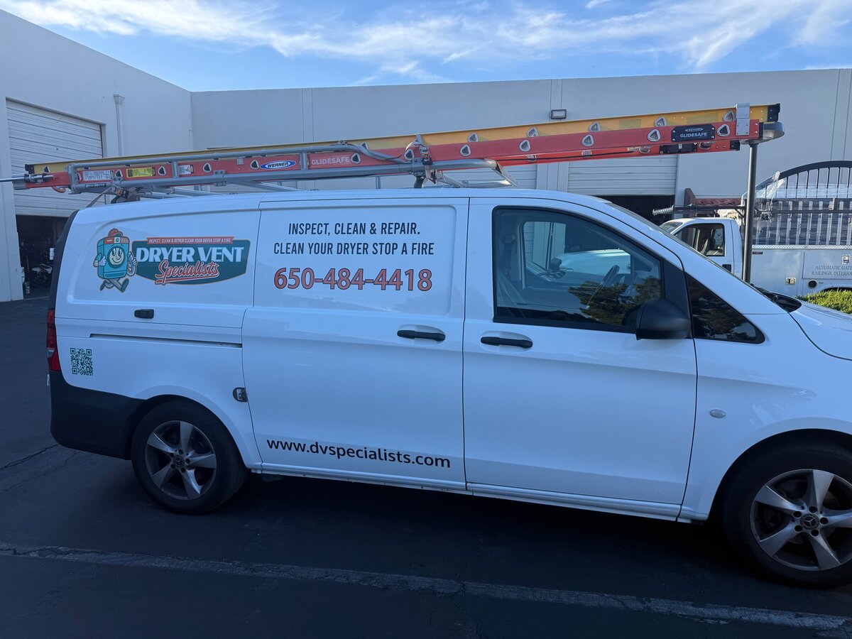 Dryer Vent Specialists service van with branding and equipment